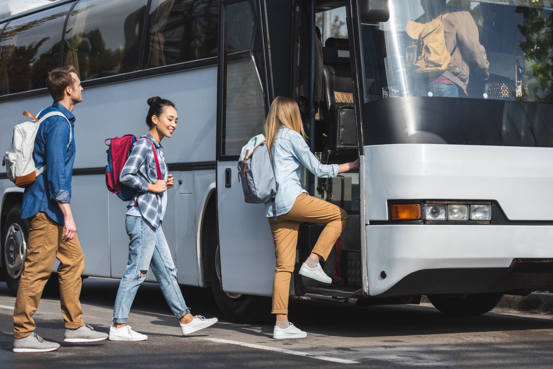 People boarding bus